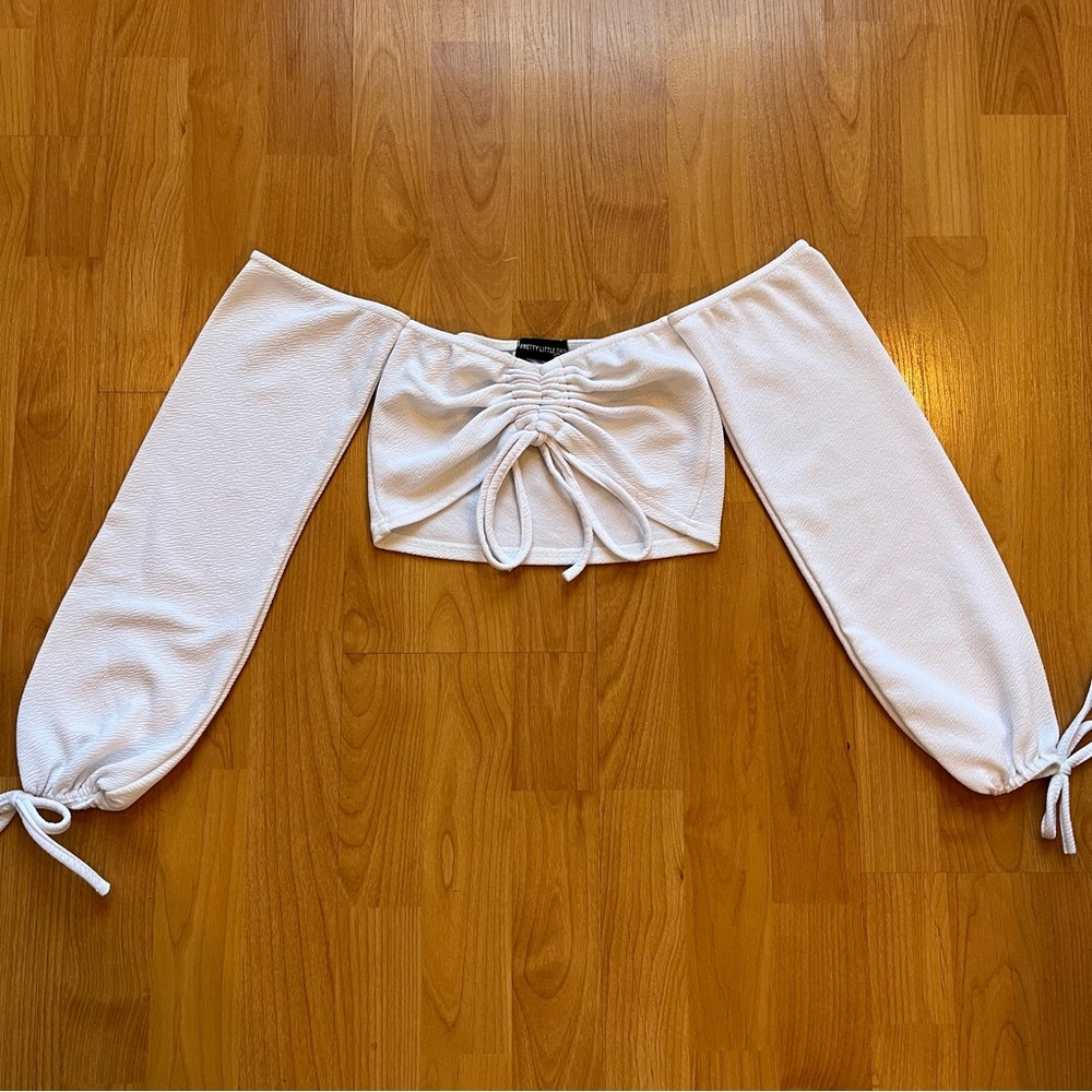 Prettylittlething White off-the-shoulder crop top